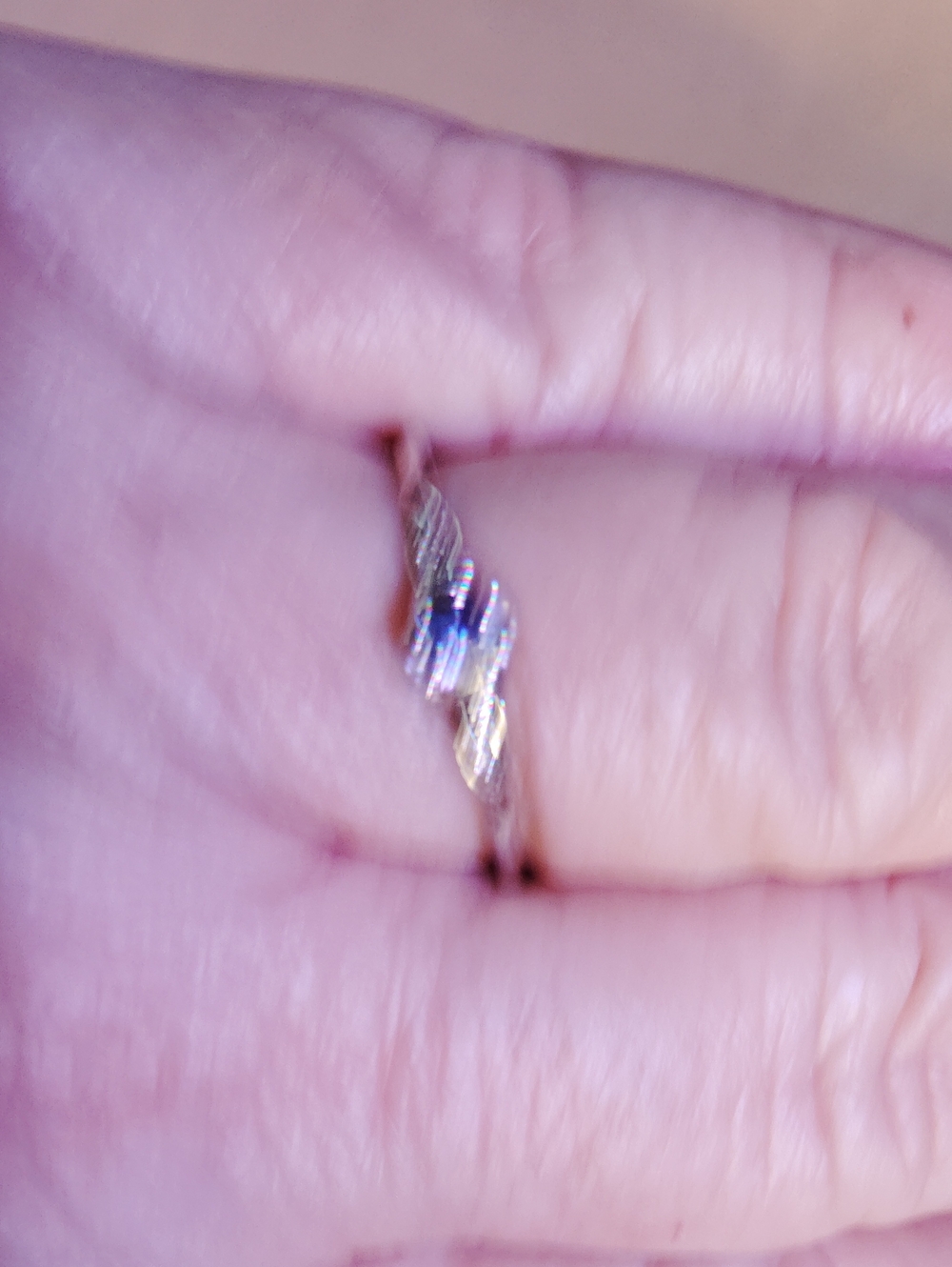 TANZANITE AND ZIRCON, SOLID STERLING SILVER, TWIST RING. SIZE 10